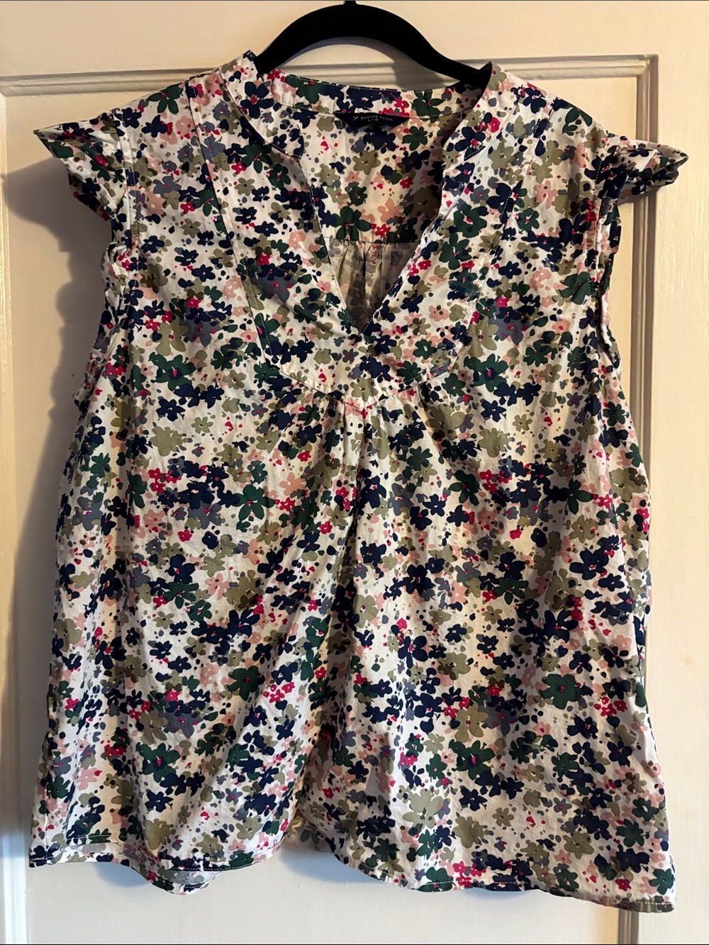 White Floral V-Neck Cap Sleeve Blouse with Green and Navy Accents